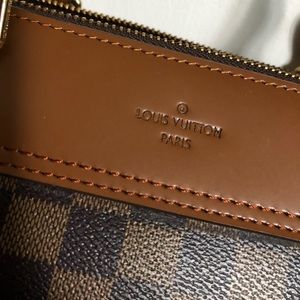 Leather famous checker board print tote/purse